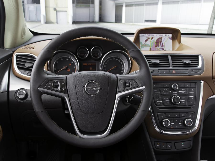  Opel Mokka 2012 года  (фото 32 из 35)